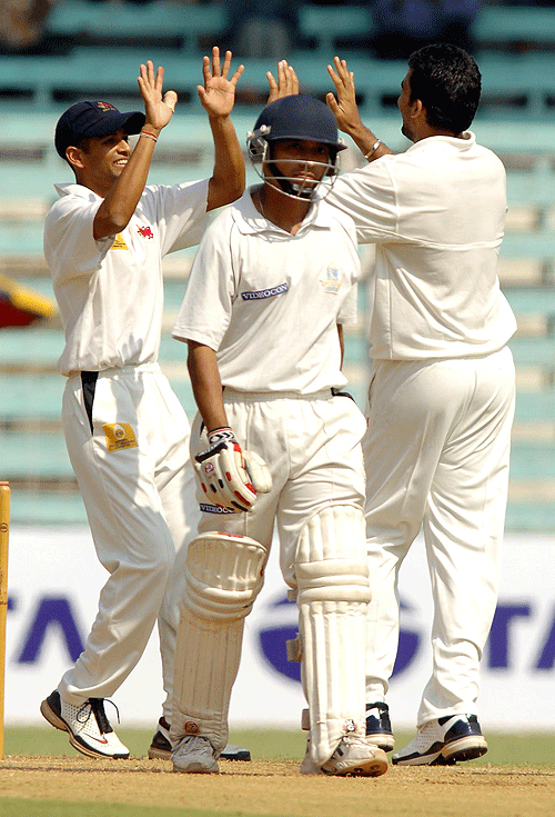 Zaheer Khan celebrates the wicket of Arindam Das