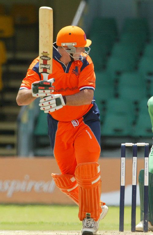 Darron Reekers clips a leg-side boundary on his way to 104