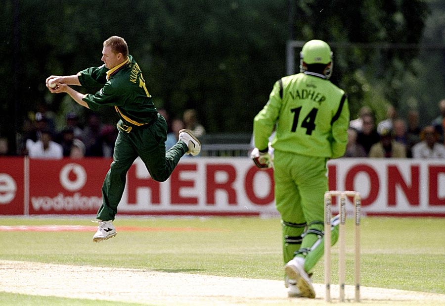 Lance Klusener plucks a return catch from Alpesh Vadher