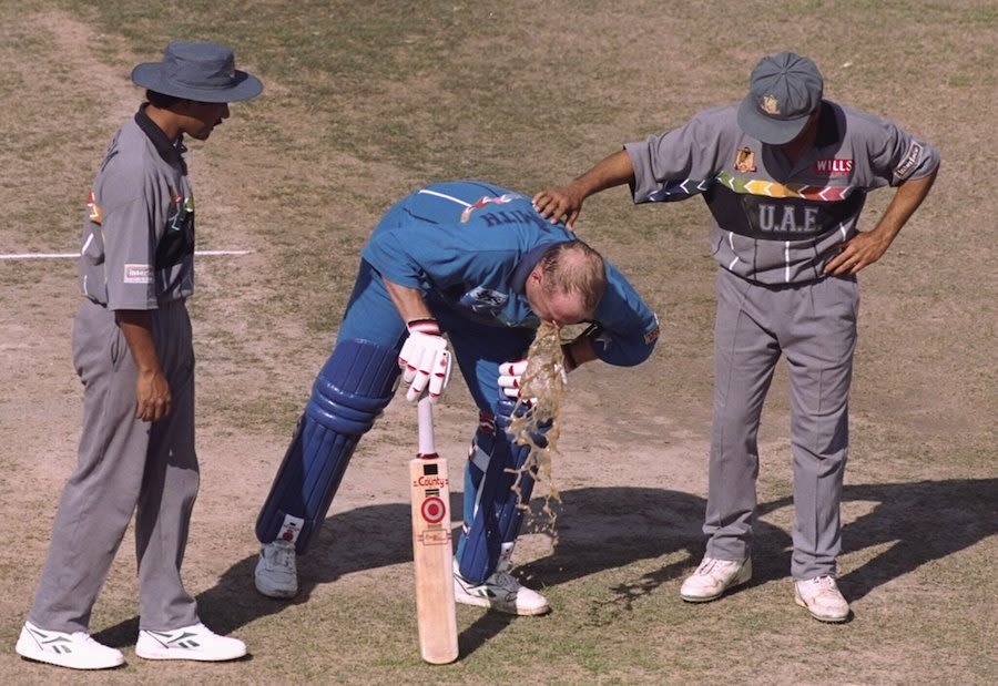 Neil Smith throws up during his innings