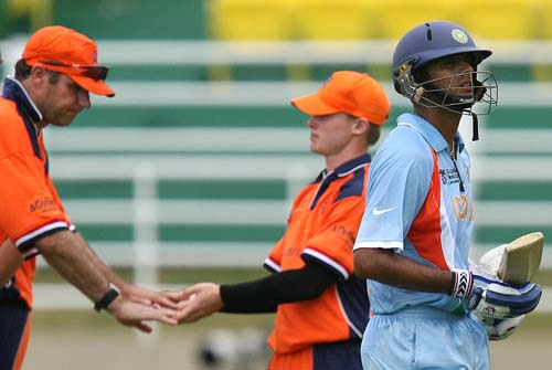 Luuk van Troost celebrates the wicket of Rahul Dravid