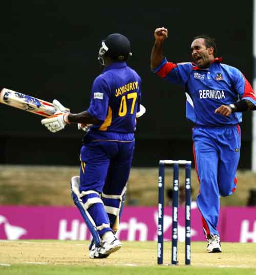 Saleem Mukuddem celebrates the wicket of Sanath Jayasuriya