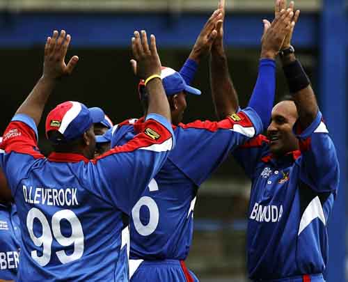 Saleem Mukuddem is the toast of his team as he gets the breakthrough against the strong Sri Lankans