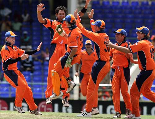 Netherlands celebrate the wicket of AB de Villiers in the very first over