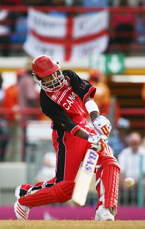 Ashif Mulla climbs into a boundary