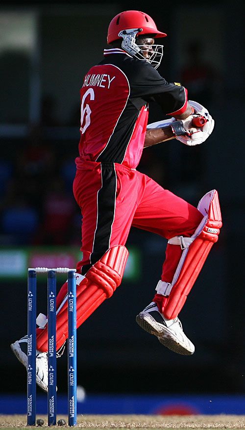 With a flourish, Desmond Chumney slaps one through the covers