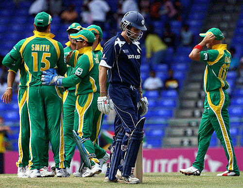 Fraser Watts makes his way back to the pavilion after being dismissed by Charl Langeveldt