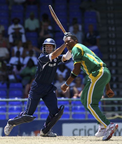 Colin Smith smacks Makhaya Ntini through the off side with confidence