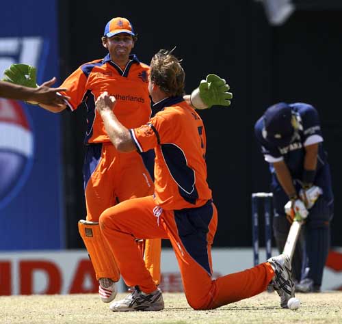 Tim de Leede pulls off a stunning return catch and Ryan Watson can't believe his luck after striking the ball so firmly