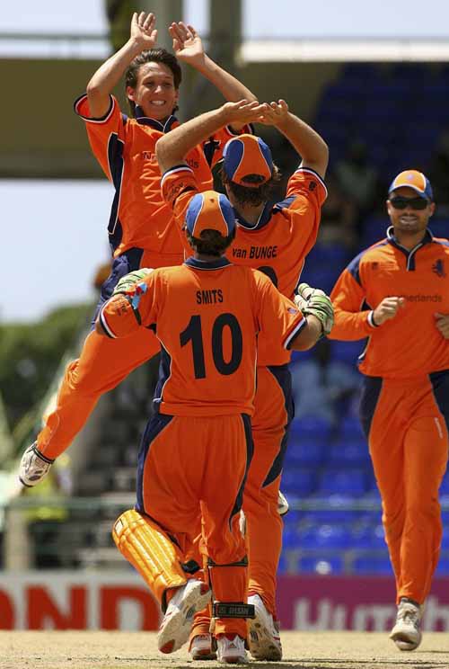Mark Jonkman leaps into the air like an athlete, his joy at getting a wicket clearly knew no bounds
