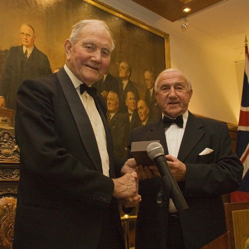 Alec Bedser is presented with a commemorative Almanack on the 60th anniversary of his being named one of the Five Cricketers of the Year