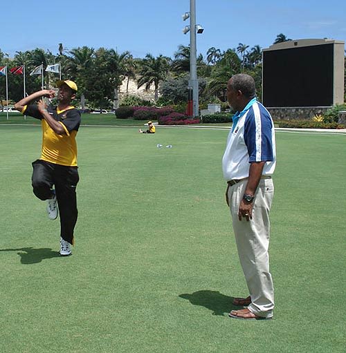 Andy Roberts helps Shahadat Hossain with his action