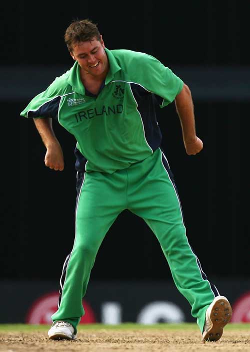 Dave Langford-Smith celebrates the wicket of Mohammad Rafique