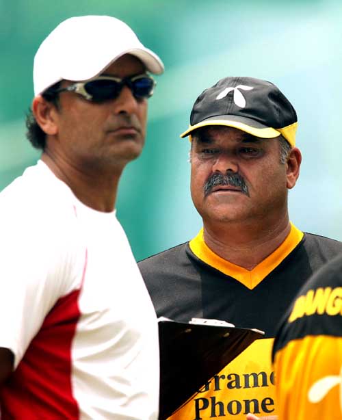 Dav Whatmore and Athar Ali Khan watch Bangladesh practice