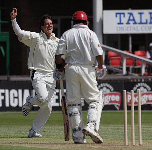 Thinus Fourie celebrates bowling Ashif Mulla