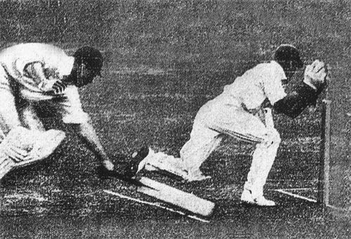 Frank Woolley is run out after taking on Lall Singh's arm