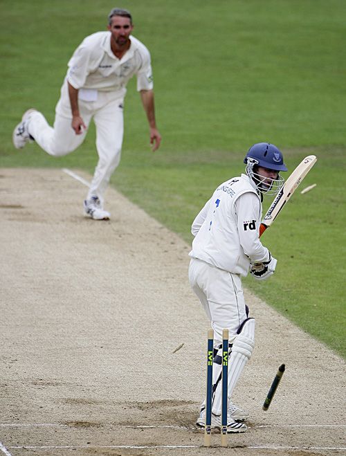 Richard Montgomerie is bowled by Jason Gillespie
