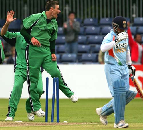 Ireland's Roger Whelan celebrates the wicket of Sachin Tendulkar