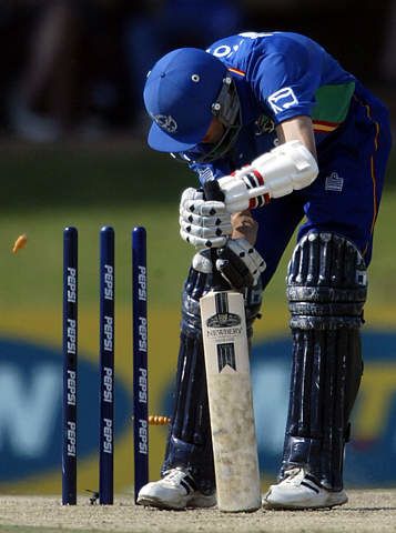 Bjorn Kotze is bowled by Glenn McGrath