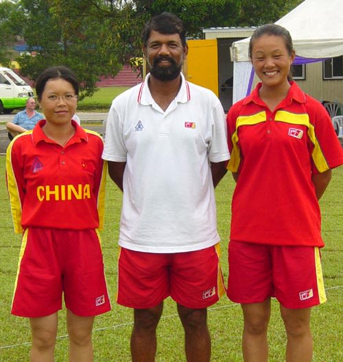 China's coach Rashid Khan with left, vice-captain Liu Bi Yu and right, captain Mei Chun Hua