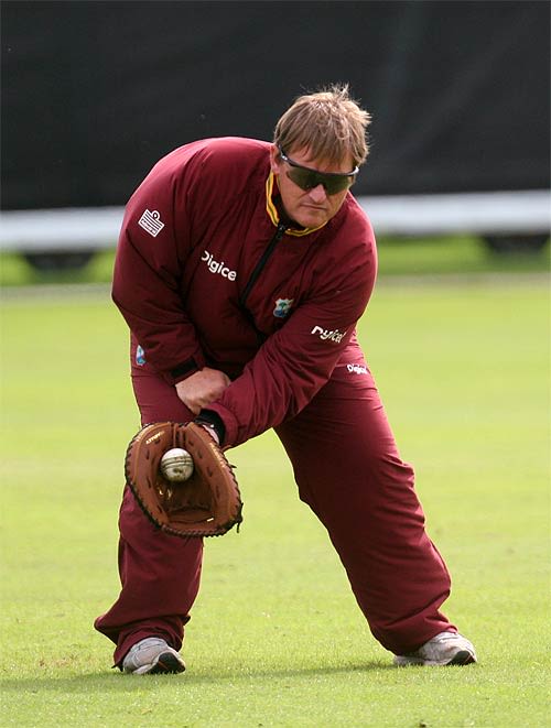 David Moore indulges in fielding practice before the start of West Indies's quadrangular series match against Scotland