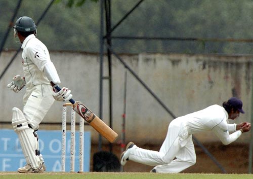 Kumar Sangakkara took a smart catch in slip to end Javed Omar's vigil at the crease