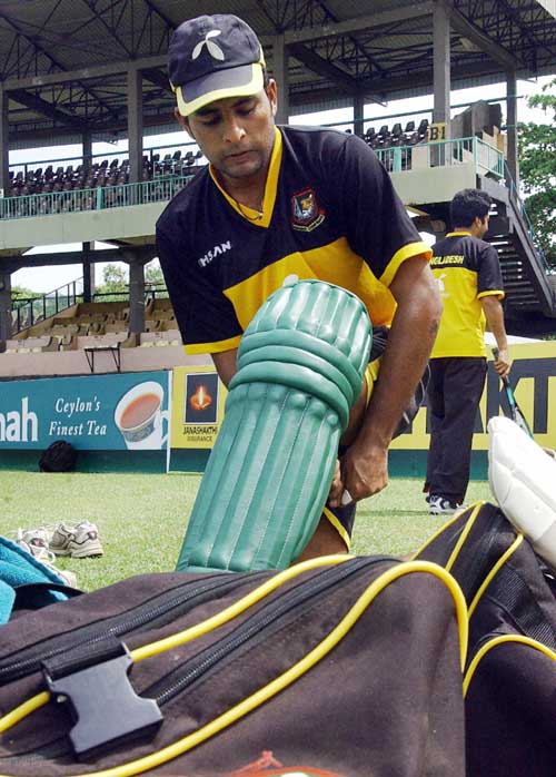 Tushar Imran prepares to bat during a practice session