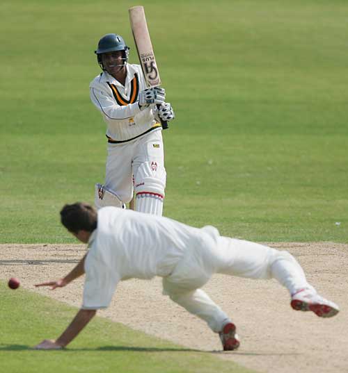 Taimur Ali drives past Chris Woakes during his 41