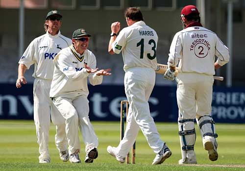 Andy Harris is congratulated on removing Marcus Trescothick