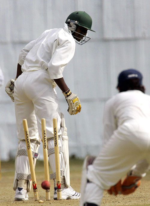 Lameck Onyango is bowled by Pankaj Singh