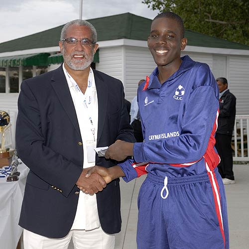 Ramon Sealy of Cayman Islands receives the Player-of-the-Tournament award