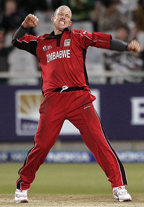 An ecstatic Gary Brent celebrates bowling Brett Lee