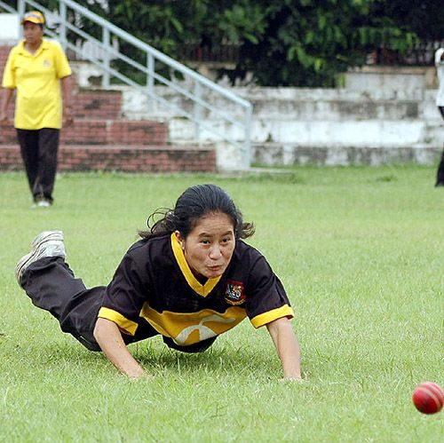 Champa Chakma dives towards the ball during a practice session