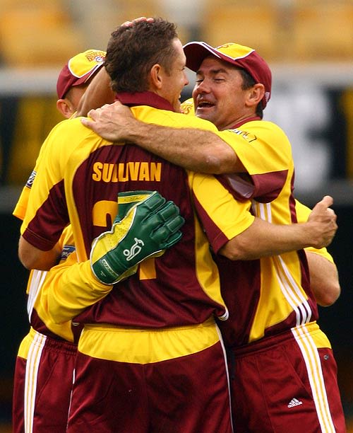 Jimmy Maher and Grant Sullivan celebrate a wicket