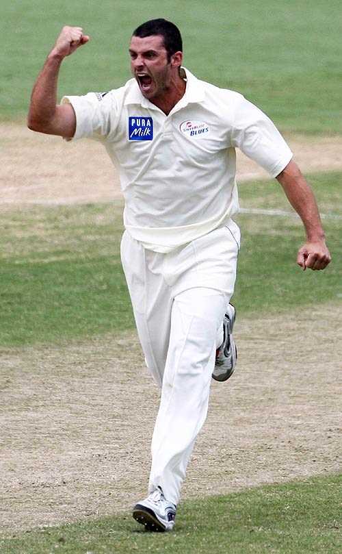 Mark Cameron celebrates one of his five wickets before lunch as he destroyed the Western Australia top order