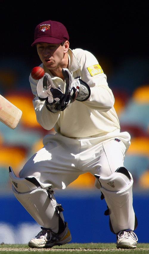 Murray Bragg watches the ball into his gloves