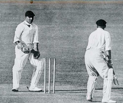 Bill Woodfull is bowled by Tommy Mitchell