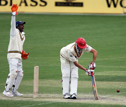 Cullen Bailey trapped in front by Muttiah Muralitharan