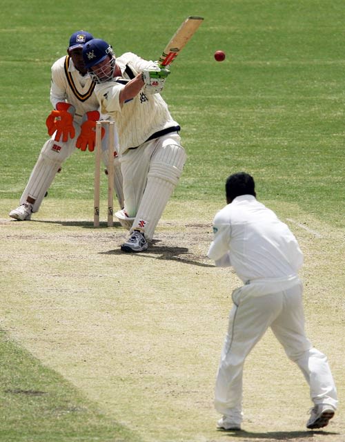 Mick Lewis smashes one off Murali