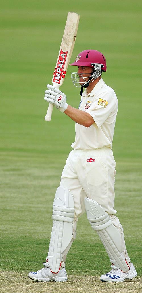 Clinton Perren celebrates his half-century as he guides the Bulls to victory