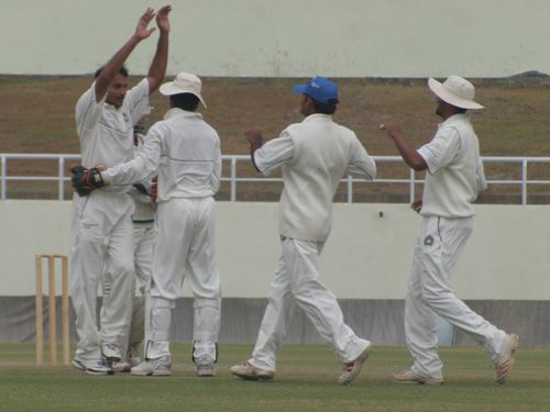 Sandeep Jobanputra celebrates the dismissal of Manish Gupta 