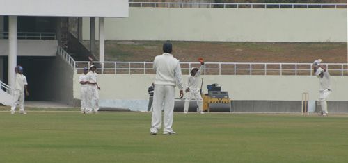 The Saurashtra players appeal for an lbw decision against Sangram Singh