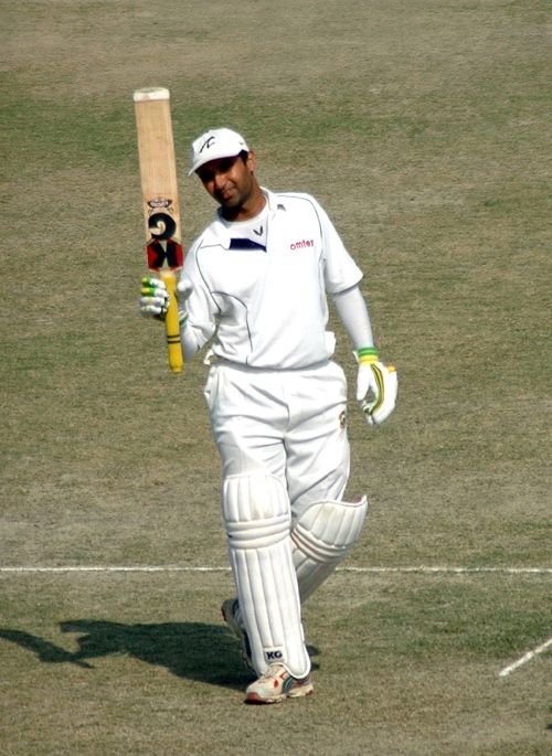 Pankaj Dharmani acknowledges the cheers after becoming the highest overall run-scorer for Punjab in the Ranji Trophy