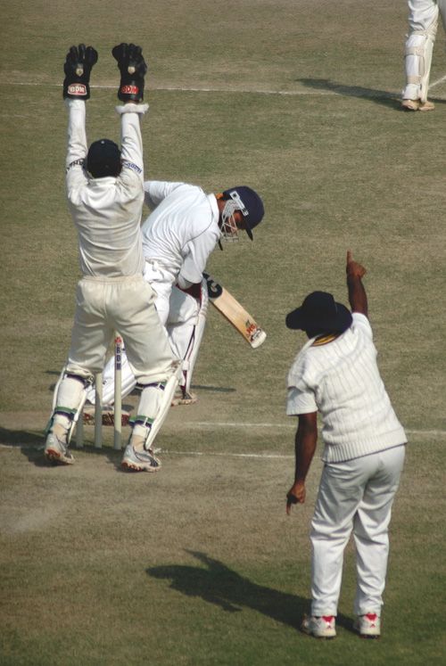 Wicketkeeper MSK Prasad appeals in vain for an lbw decision against Pankaj Dharmani