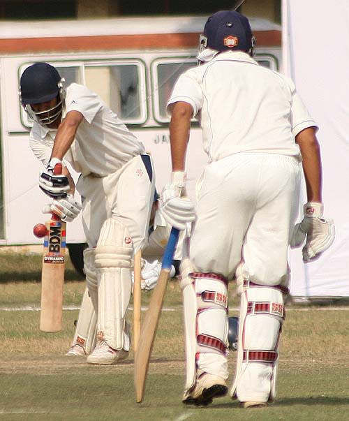Ian Dev Singh defends a delivery during his 104
