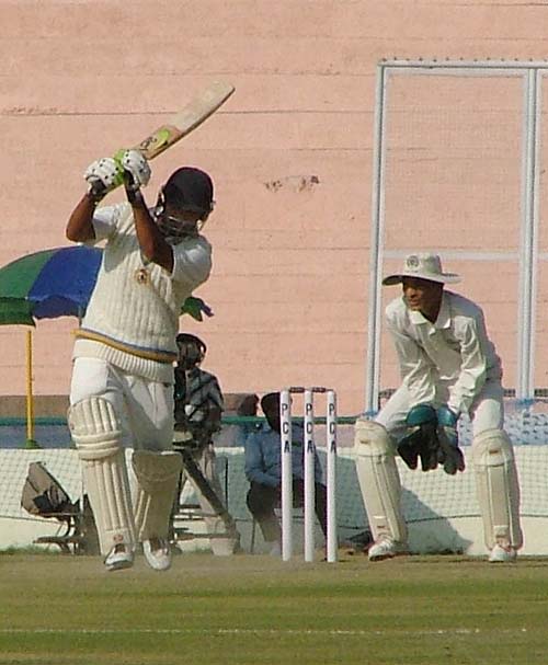 Karan Goel drives on his way to 75