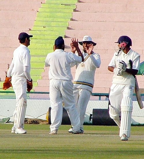 Punjab celebrate after Birinder Singh bowled Anoop Pai for 2