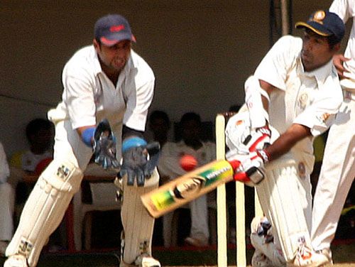 Sreekumar Nair tries to sweep during his triple-hundred