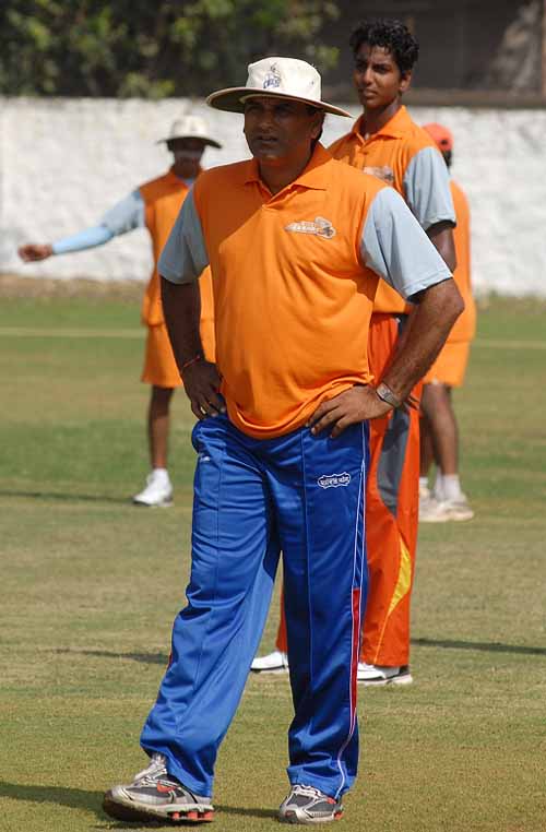 Rajesh Chauhan, the former India offspinner, oversees a practice session