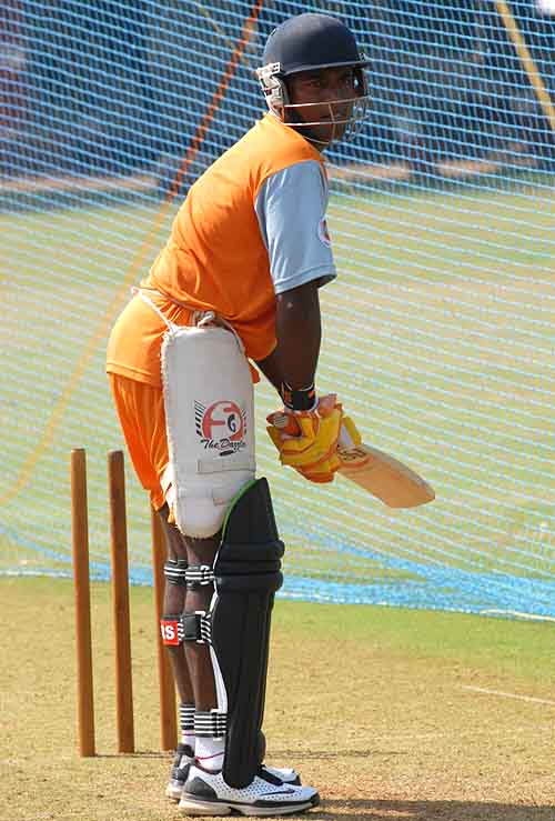 Kiran Powar has a hit in the nets during a Mumbai Champs training session